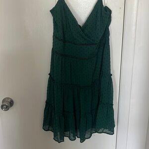 Mini green dress with dot accents